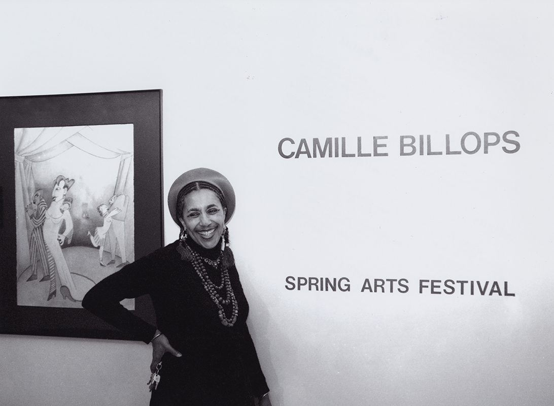 Camille Billops poses in front of her artwork